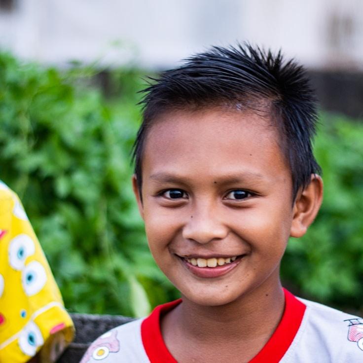 Alex Morgan, Lead Design Curator at SectorFieldLumen, reviewing corporate floral arrangements